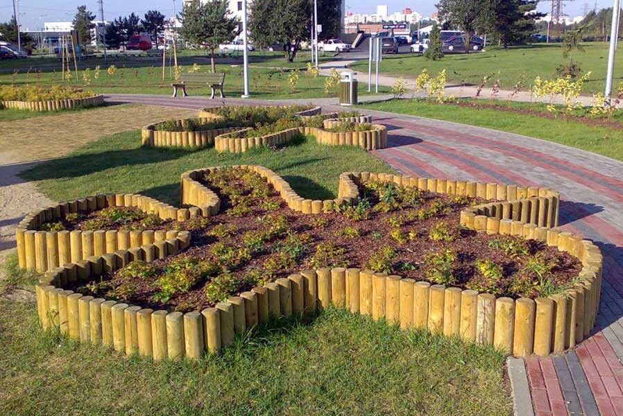 s-l1600fffAdMn8xDP6wd3A Palisaden Ø 10 cm aus kesseldruckimprägniertem Holz Palisade zur Beetumrandung Beeteinfassung