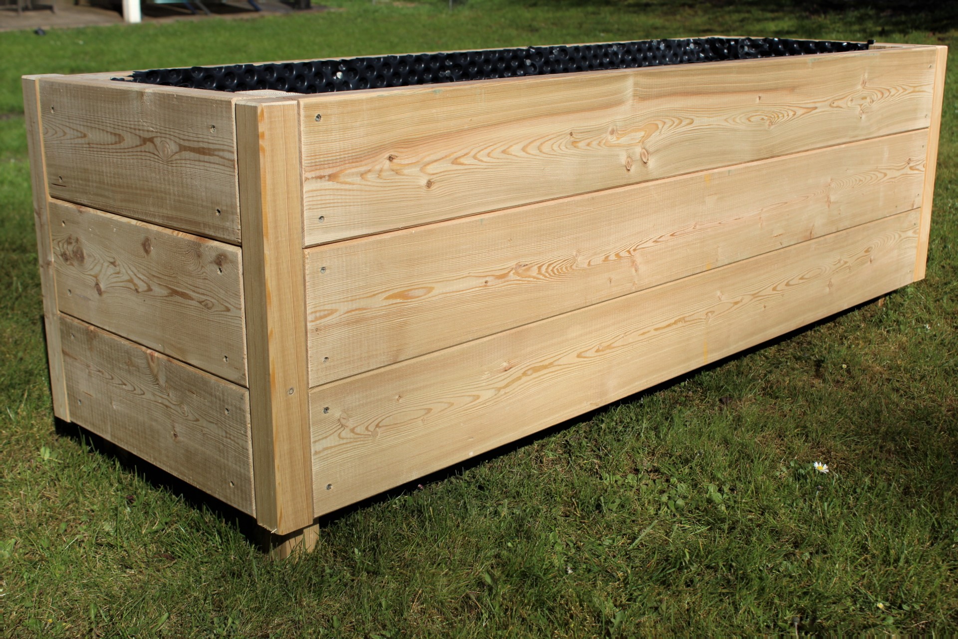 Foto-4TrJ5si3tTYc3y Blumenkasten Hexenagger Lärchenholz Kanthölzern 45x142 mm mit Noppenfolie fertig montiert